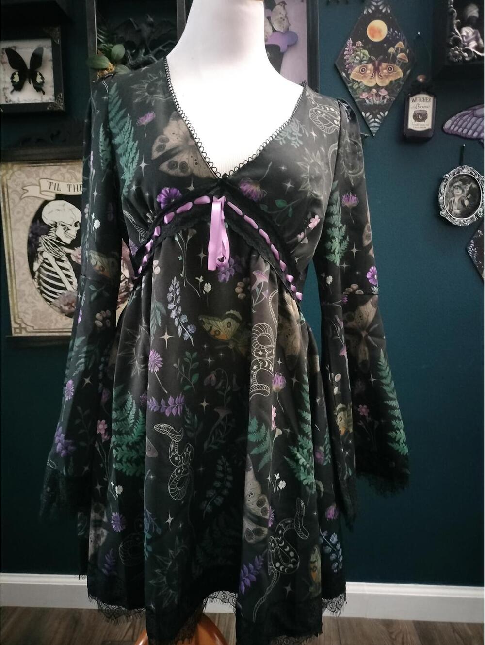 Witchy black dress with moths, mushrooms, flowers.